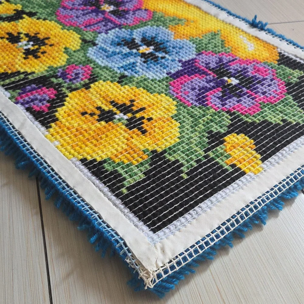 Completed Caron Wonderart Pot of Pansies Rug